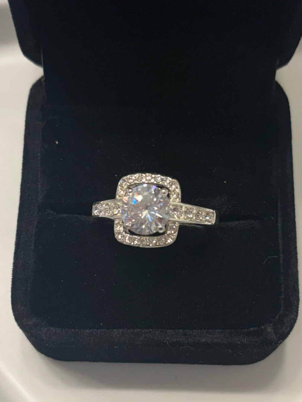 Sparkling Silver Halo Ring with Clear Center Stone
